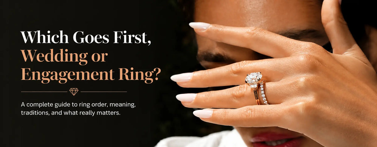 Which ring goes first, wedding or engagement ring? Woman wearing an engagement ring above a wedding band on her ring finger.