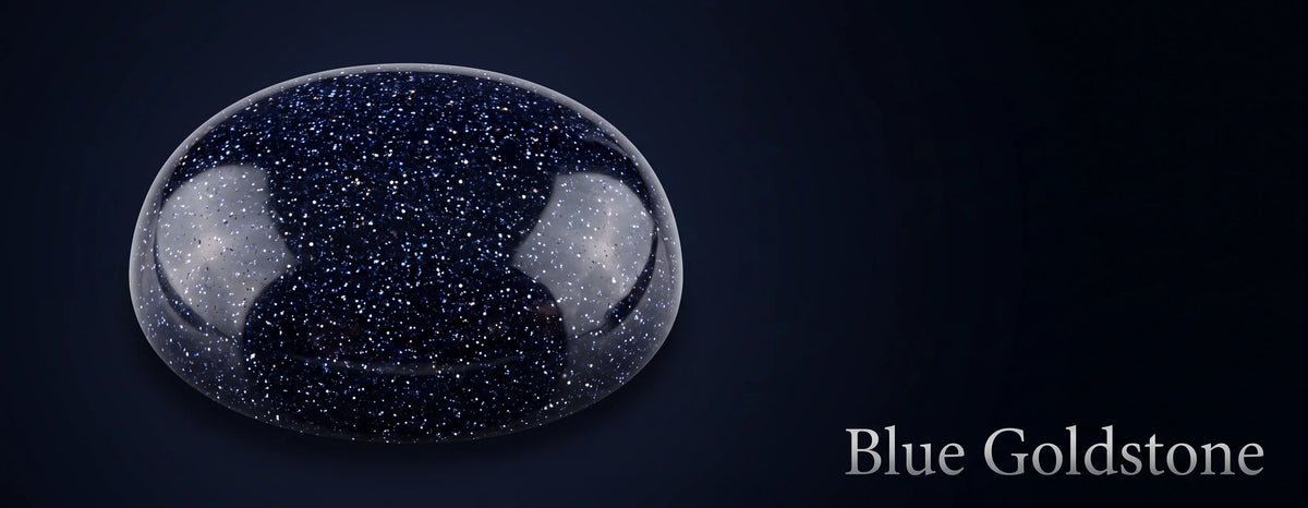Close-up of deep blue goldstone with tiny silver-white copper crystals sparkling throughout the dark blue glass