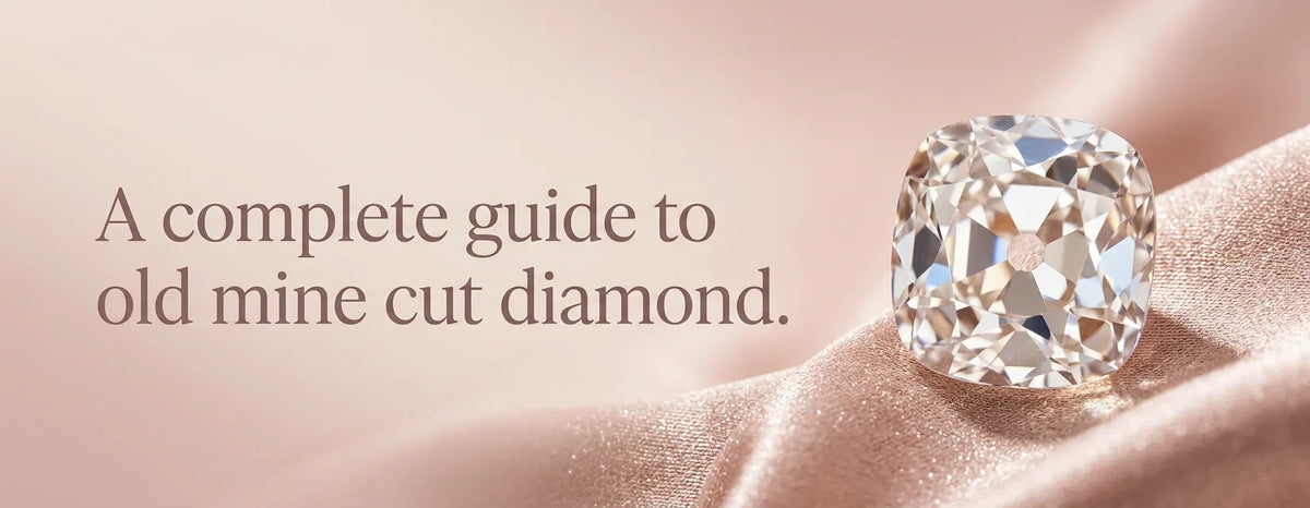 Old mine cut diamond with cushion outline and open culet on pink satin, featured image for a complete guide