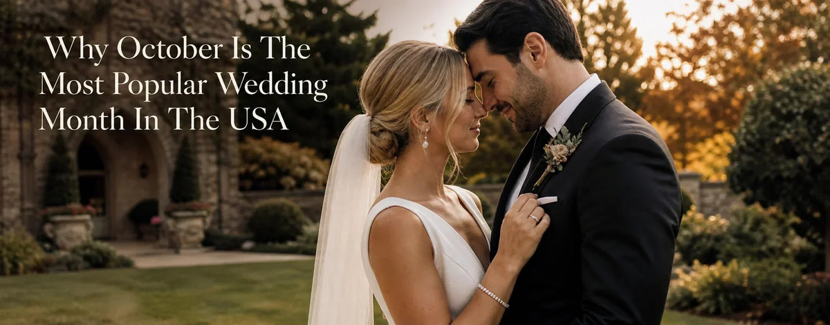Bride and groom at an elegant outdoor October wedding with subtle autumn foliage, soft late-afternoon light, and the bride's wedding ring and bracelet visible.