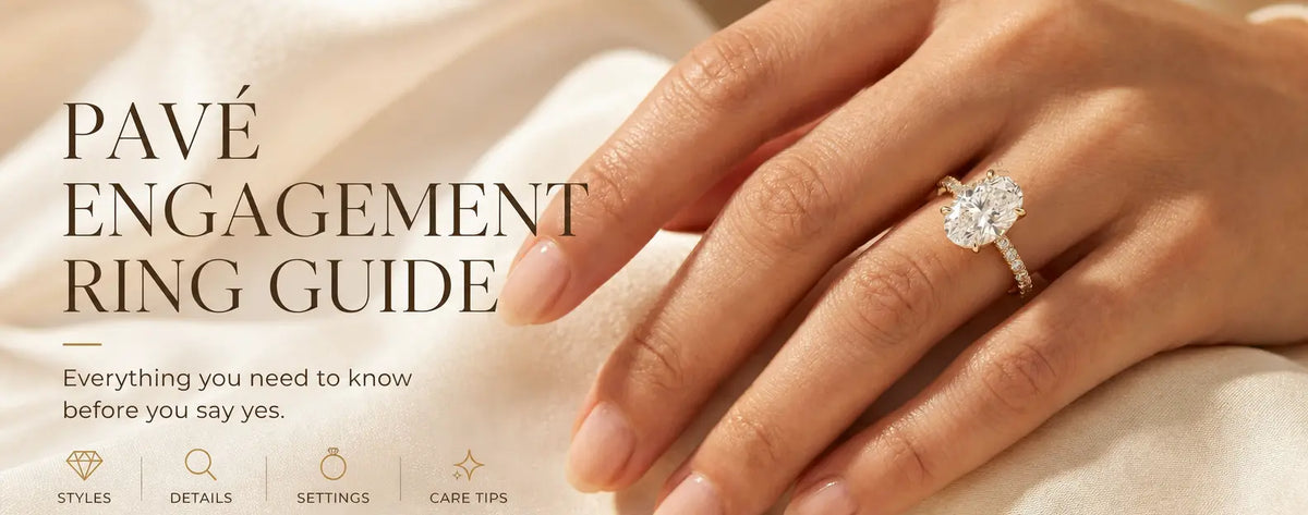 A hand of woman with oval cut solitaire pave engagement ring in the fourth finger: Text is "Pave Engagement Ring Guide"