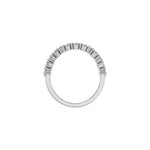 This white gold ring displayed on through finger view is made with brilliant round diamond and baguette diamond set in prong setting