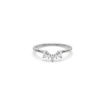 white gold curved tiara wedding band with alternating round and baguette diamonds ring. Delicate arching stacking ring for women.