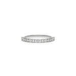 This white gold ring displayed on front view is made with brilliant round diamond and baguette diamond set in prong setting