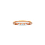 This rose gold ring displayed on front view is made with brilliant round diamond and baguette diamond set in prong setting