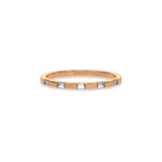 This rose gold Half Eternity Distance Diamond Band made with baguette diamonds and arranged at intervals creating and alternating pattern between gold and diamond in top view