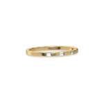 This yellow gold Half Eternity Distance Diamond Band made with baguette diamonds and arranged at intervals creating and alternating pattern between gold and diamond in side view