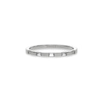 This white gold Half Eternity Distance Diamond Band made with baguette diamonds and arranged at intervals creating and alternating pattern between gold and diamond in top view