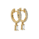 This yellow gold Dangling Baguette Diamond Hoop Earrings handmade with round brilliant-cut diamonds in prong setting and a baguette solitaire hanging at the bottom in side view