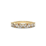 This yellow gold half eternity ring made with slanted baguette diamonds and round diamonds in an alternating pattern set securely in prongs in top view