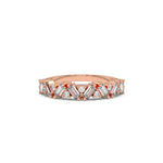 This rose gold A half eternity ring made with slanted baguette diamonds and round diamonds in an alternating pattern set securely in prongs in top view