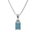 This white gold Fancy Blue Emerald Solitaire Diamond Necklace made with an fancy Blue emerald cut diamond in a four prong setting with adjustable chain in top view