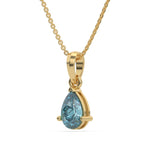 This yellow gold Fancy Blue Pear Solitaire Diamond Necklace made with a fancy Blue pear cut diamond in a four prong setting with adjustable chain in side view