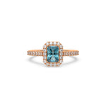 This rose gold ring displayed in front view is made with a radiant solitaire diamond set in four-prong setting