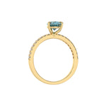 This yellow gold ring is made with a fancy Blue pear solitaire diamond set in three-prong setting, and is complemented by a round pave diamonds band in through finger view