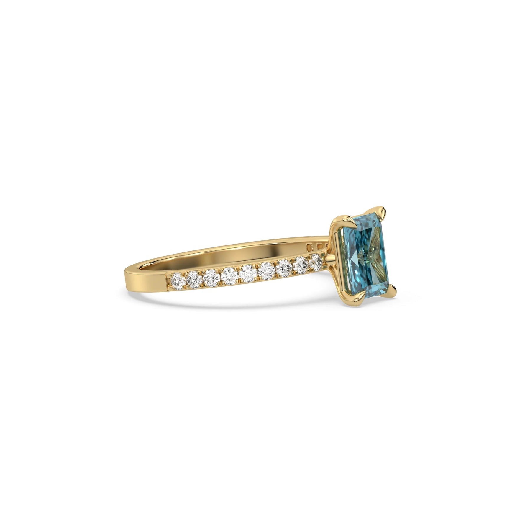 This yellow gold ring displayed in side view is made with a radiant solitaire diamond set in four-prong setting