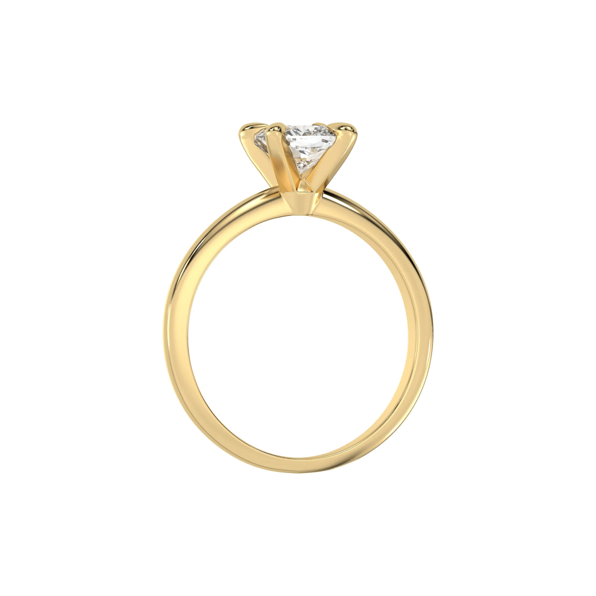 This yellow gold ring features a cushion solitaire diamond elegantly secured in a four-prong setting on a solid gold band in through finger view