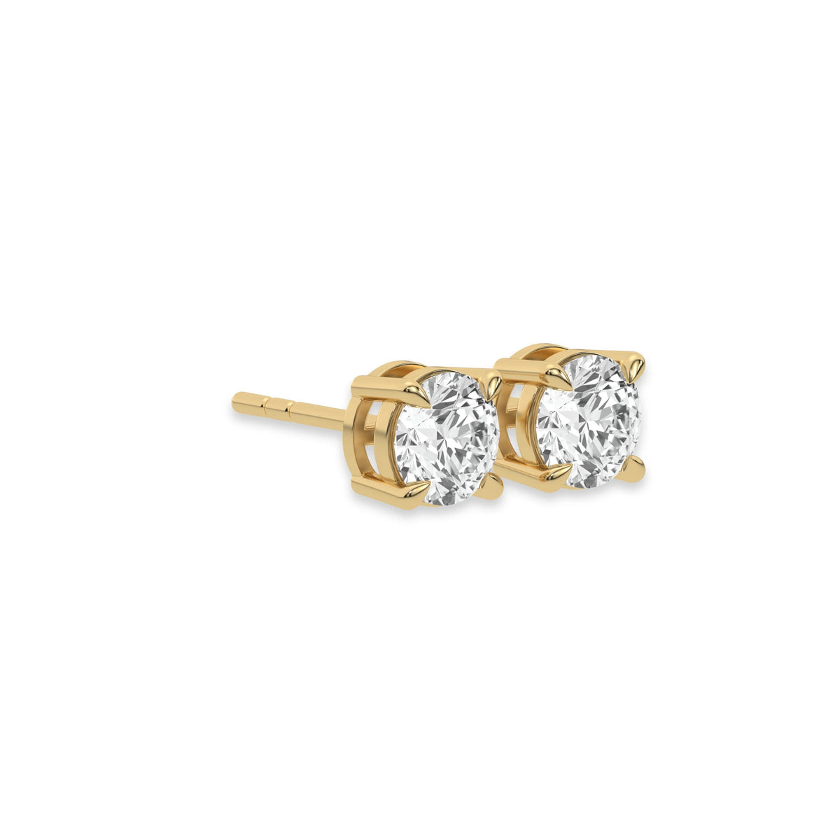 This yellow gold Classic Round Diamond Studs made with round brilliant-cut diamonds set in a four prong setting in side view