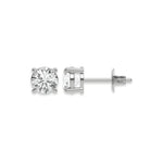 Close up of a pair of earrings featuring a Round diamond stud earring in prong-set and white gold on a white background.