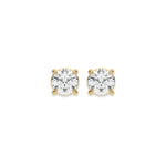 Close up of a pair of earrings featuring a Round diamond stud earring in prong-set and white gold on a white background.