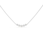 This white gold Necklace with five round diamonds arranged in gradually decreasing sizes from the center, each securely set in bezel in top view