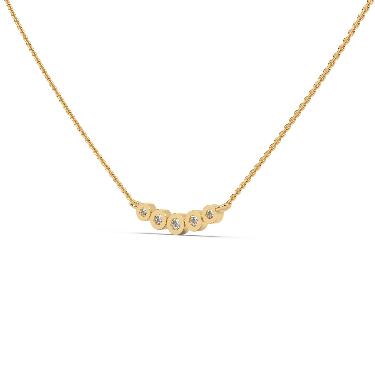 This yellow gold Necklace with five round diamonds arranged in gradually decreasing sizes from the center, each securely set in bezel in side view