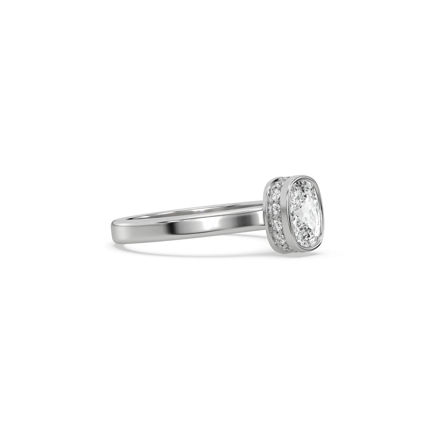 This white gold ring displayed on side view is made with cushion  solitaire diamond set in bezel setting