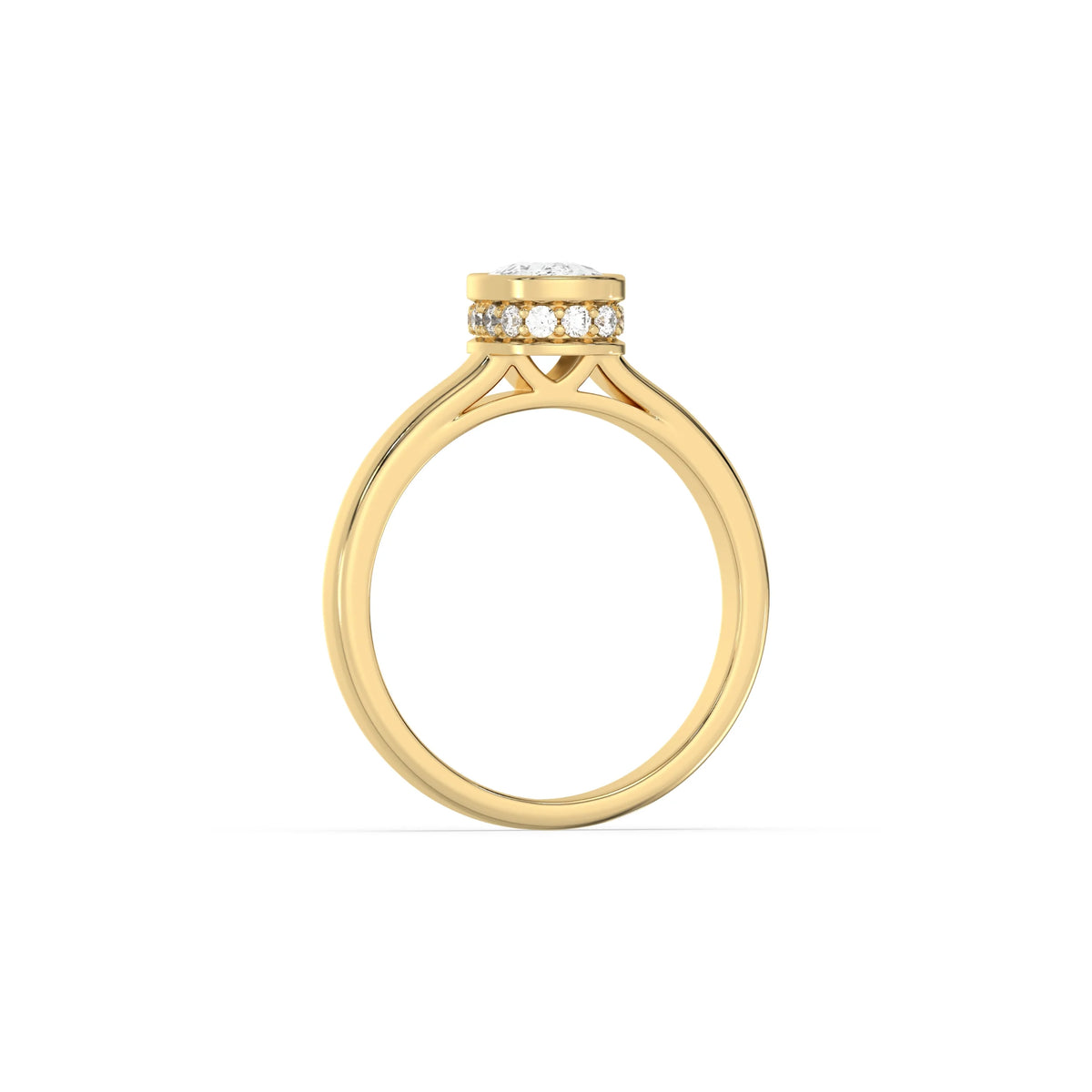 This yellow gold ring displayed on through finger view is made with cushion  solitaire diamond set in bezel setting