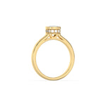 This yellow gold ring displayed on through finger view is made with cushion  solitaire diamond set in bezel setting