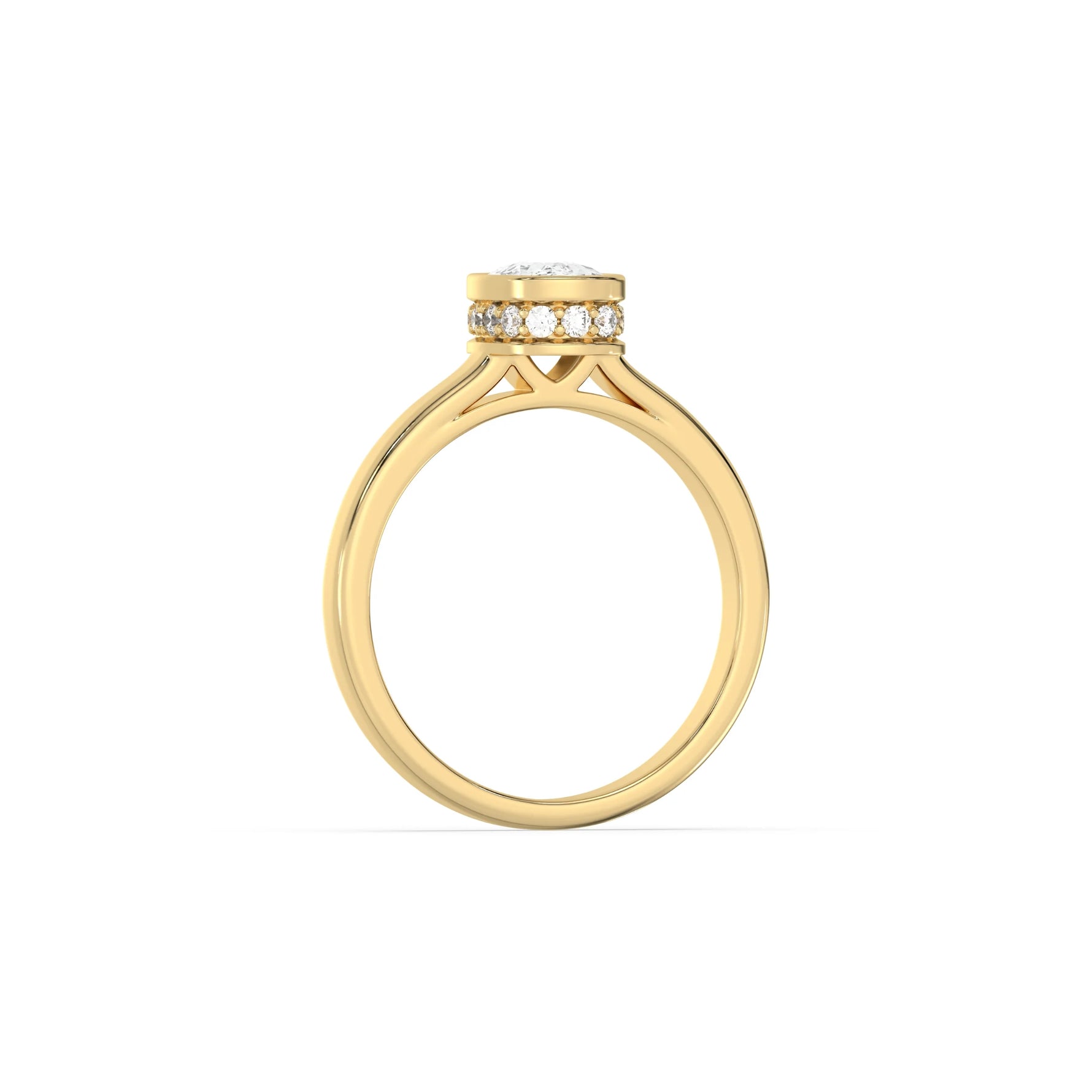 This yellow gold ring displayed on through finger view is made with cushion  solitaire diamond set in bezel setting