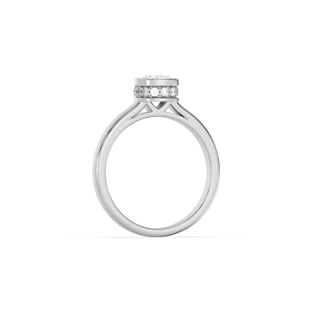 This white gold ring displayed on through finger view is made with cushion  solitaire diamond set in bezel setting