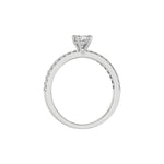 This white gold ring is made with a cushion solitaire diamond set in four-prong setting in through finger view