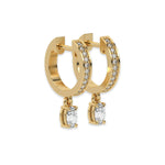 This yellow gold Dangling Oval Diamond Hoop Earrings handmade with round brilliant-cut diamonds in pave setting and an oval solitaire hanging at the bottom in side view