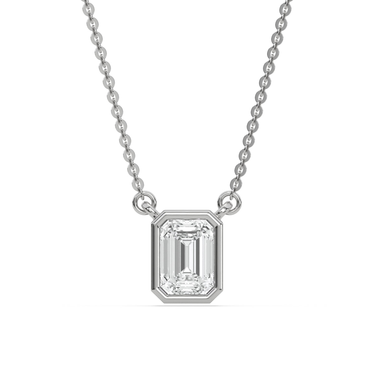 This white gold Emerald Solitaire Diamond Necklace made with an emerald cut diamond in bezel setting with adjustable chain in top view