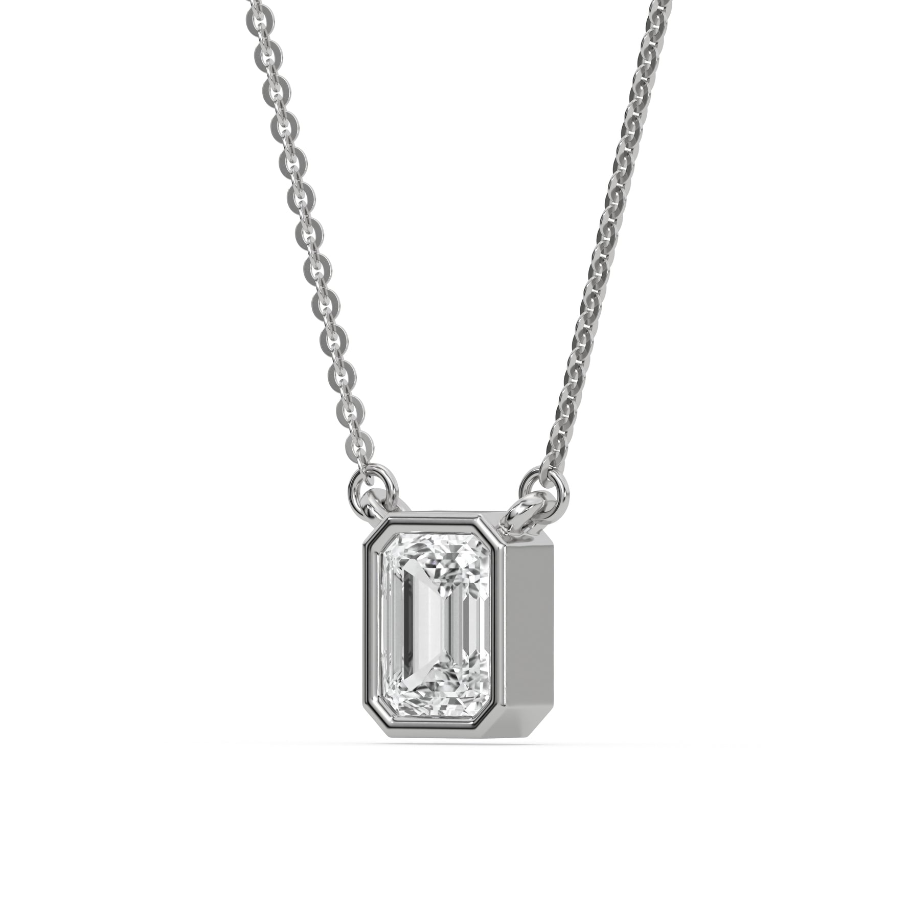 This white gold Emerald Solitaire Diamond Necklace made with an emerald cut diamond in bezel setting with adjustable chain in side view