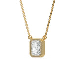 This yellow gold Radiant Solitaire Diamond Necklace made with a radiant cut diamond in bezel setting with adjustable chain in side view