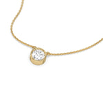 Sparkling Round Diamond necklace pendant in polished yellow gold. The brilliant-cut diamond is securely bezel-set on a delicate cable chain.