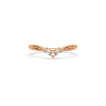 This rose gold ring displayed in front view is made with round brilliant-cut diamonds and baguette diamonds all set in a shared prong setting