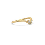 This yellow gold ring displayed in side view is made with round brilliant-cut diamonds and baguette diamonds all set in a shared prong setting