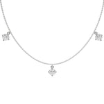 Round Dangling Diamond Necklace made with five round brilliant-cut diamonds each set in a prong setting, distributed evenly along the chain