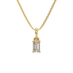 This yellow gold Emerald Solitaire Diamond Necklace made with an emerald cut diamond in a four prong setting with adjustable chain in top view