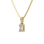 This yellow gold Emerald Solitaire Diamond Necklace made with an emerald cut diamond in a four prong setting with adjustable chain in side view