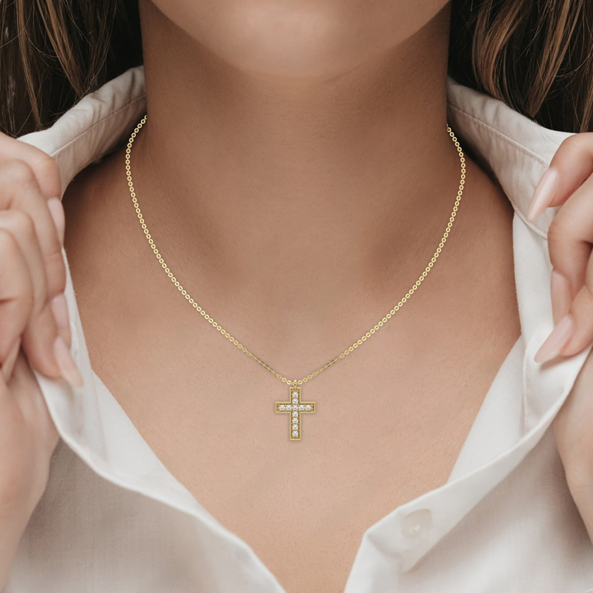 This yellow gold Cross Diamond Necklace made with round brilliant-cut diamonds, securely set in prong setting 