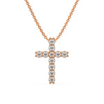 Elegant cross pendant round diamond necklace in rose gold with prong and pave-set sparkling diamonds.