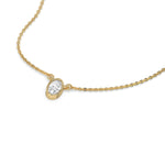 This yellow gold Oval Solitaire Diamond Necklace made with an oval cut diamond in bezel setting with adjustable chain in 3d view