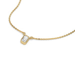 This yellow gold Emerald Solitaire Diamond Necklace made with an emerald cut diamond in bezel setting with adjustable chain in 3d view