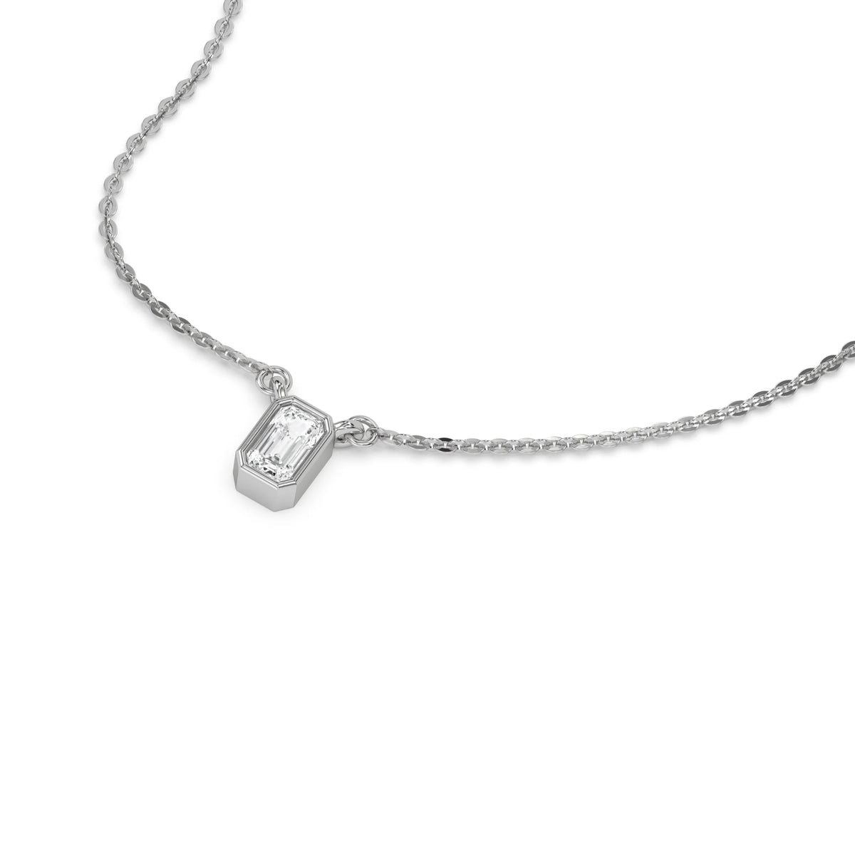High-angle view of a bezel-set Emerald Diamond necklace featuring a step-cut solitaire stone in yellow gold.