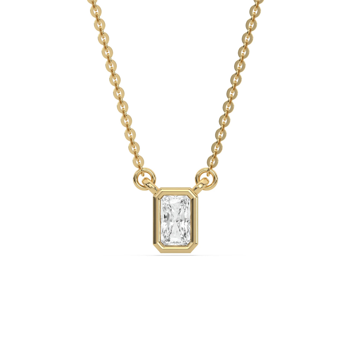 Modern bezel-set radiant Diamond necklace in 14K yellow gold showcasing an elongated solitaire diamond pendant with a white background.