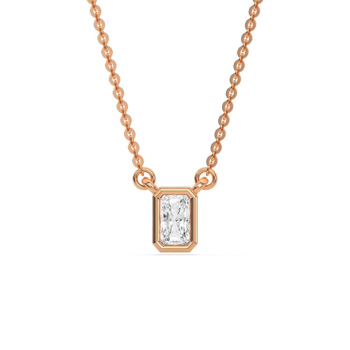 Modern bezel-set radiant Diamond necklace in rose gold showcasing an elongated solitaire diamond pendant with a white background.
