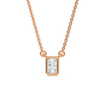 Modern bezel-set radiant Diamond necklace in rose gold showcasing an elongated solitaire diamond pendant with a white background.